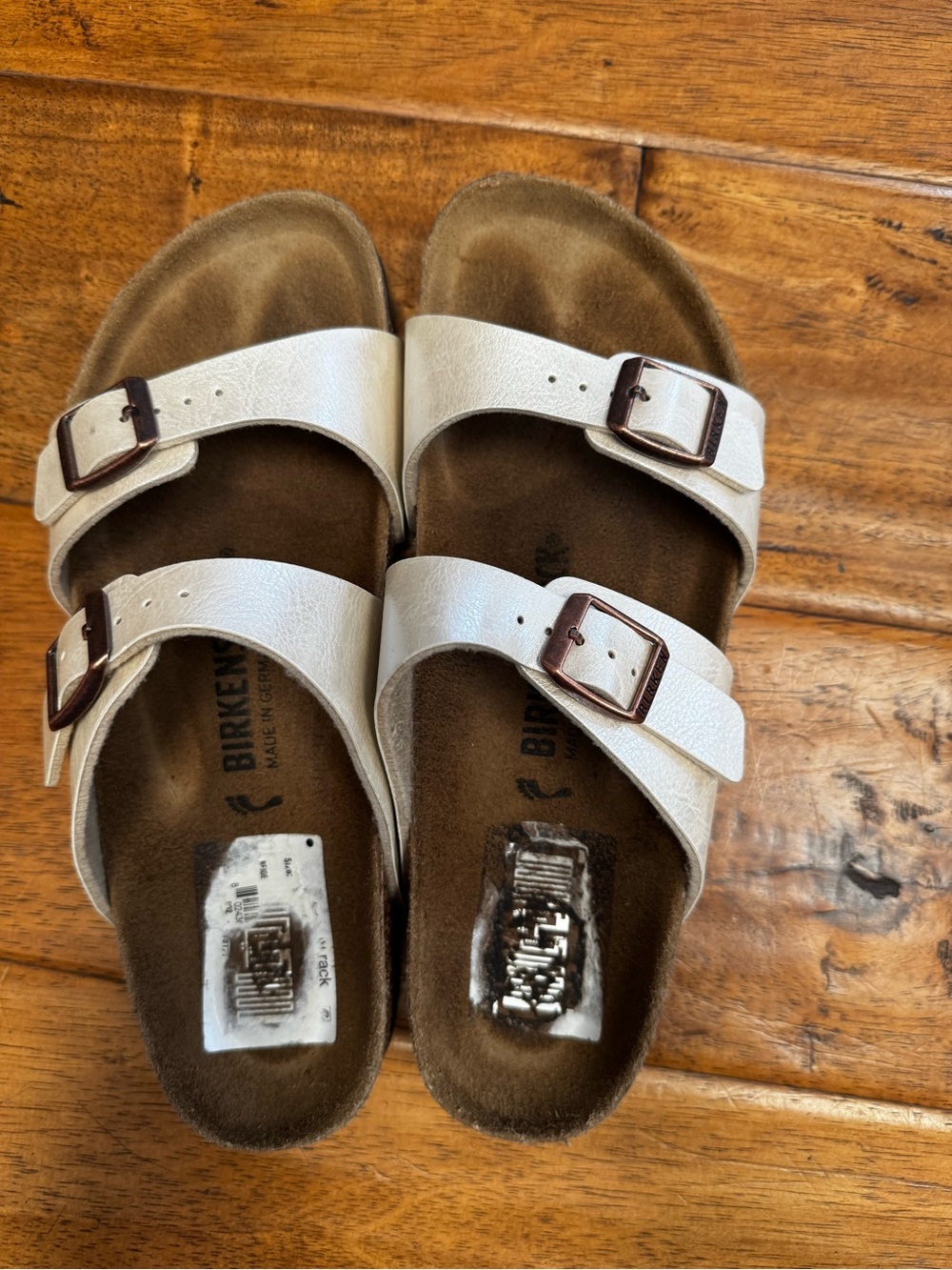 Birkenstock Arizona pearlized cream rose gold buckle sandals